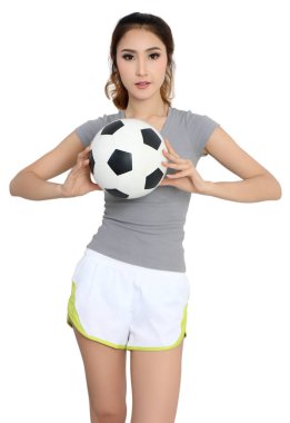 Genç Asyalı kadın futbol elinde tutan spor aşınmaya