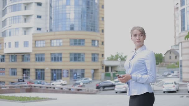 Young Business Woman Standing Area Waiting Someone Woman Holds Phone — Stock Video