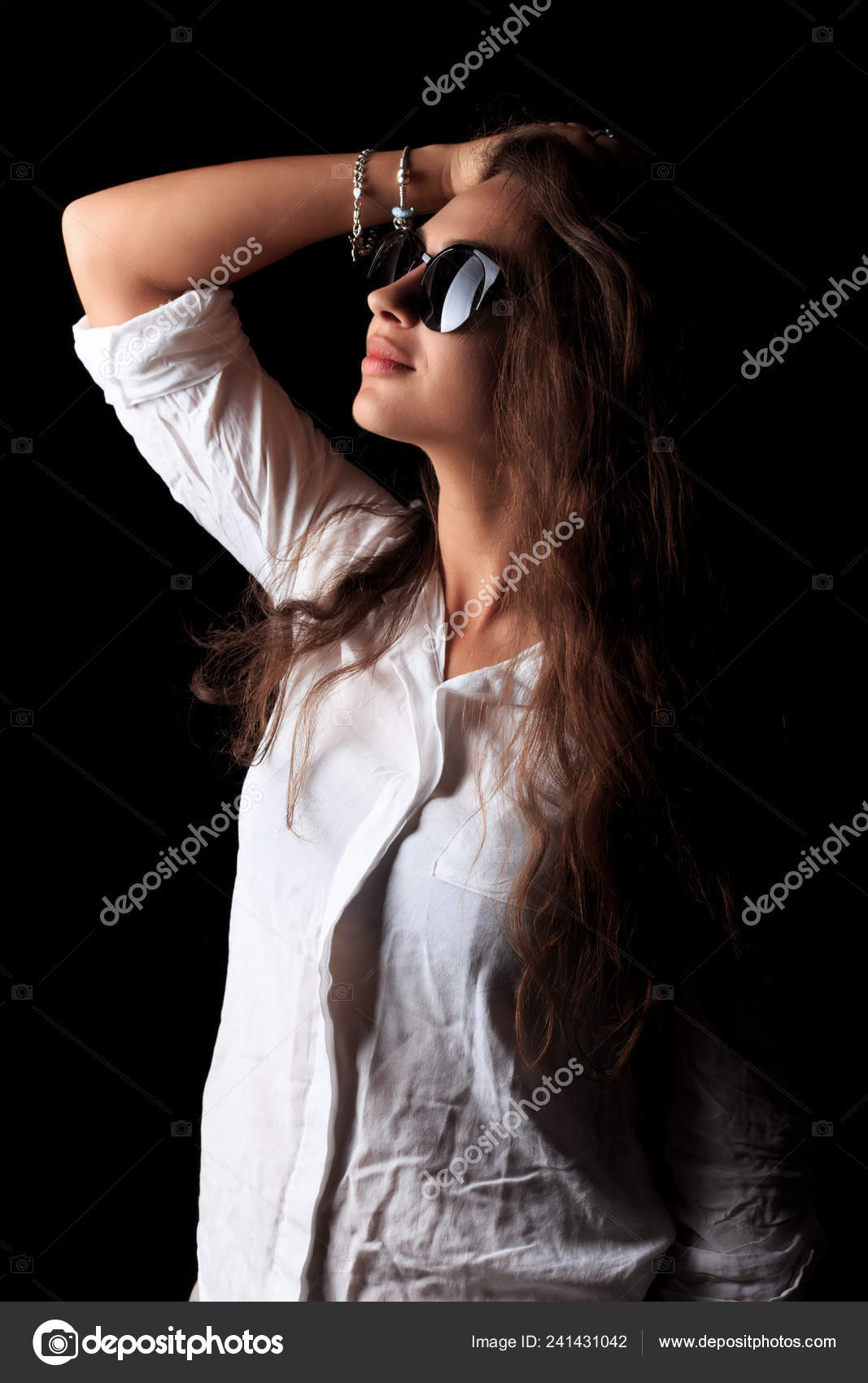 Young Swarthy Woman Posing Camera Black Sunglasses Low Key