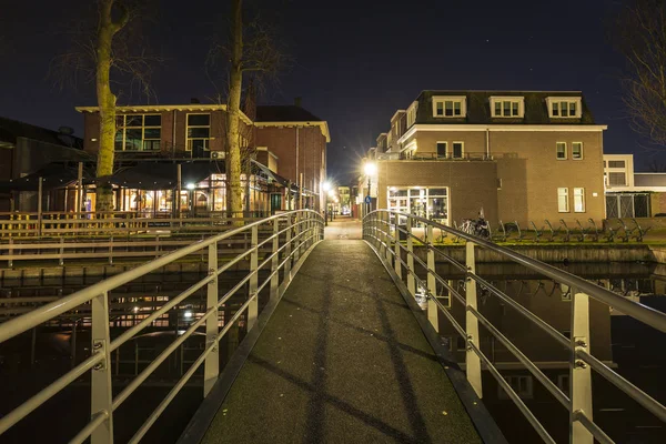 Street view at night old historic dorpsstraat Zoetermeer