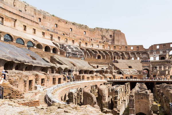 Wide Interior View of Roman Colosseum on Sunny day with blue ski