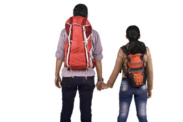 Back View Asian Couple Backpacks Holding Hands Posing Isolated White — Stock Photo, Image