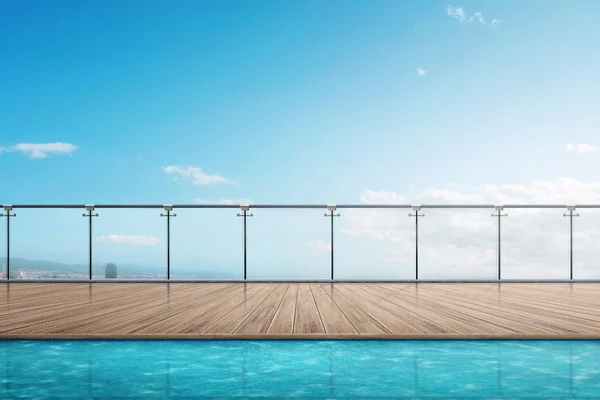The edge swimming pool on the building balcony with blue sky background