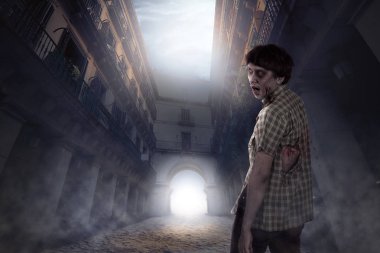 Terk edilmiş yer yaşayan korkunç zombi adam. Cadılar Bayramı kavramı