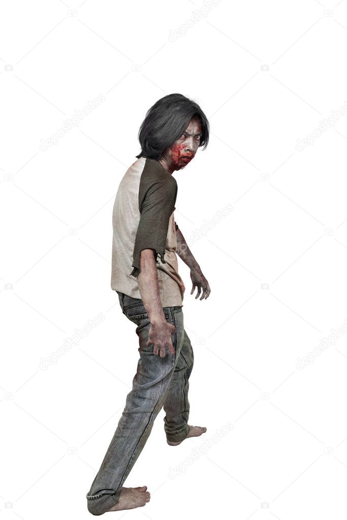 Rear view of zombie man with bloody mouth standing isolated over white background