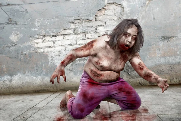 Creepy zombie man with dirty body against grunge wall background