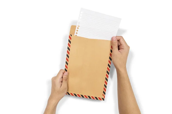 Mãos Inserir Papel Envelope Marrom Isolado Sobre Fundo Branco — Fotografia de Stock