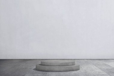 Gri duvar arka plan ile boş podyum