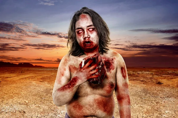 Terrible Zombie Man Blood Eating Raw Meat Dry Land — Stock Photo, Image