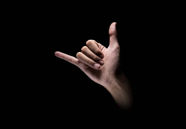 男性手与语言手势标志在黑暗的背景 — 图库照片