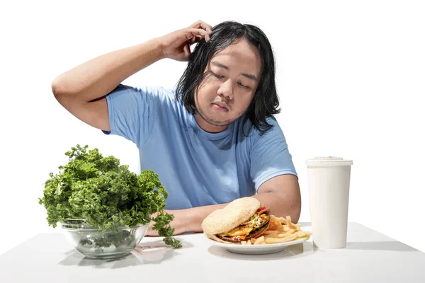 Young Asian Fat Man Confused Choosing Fast Food Healthy Food — Stock Photo, Image