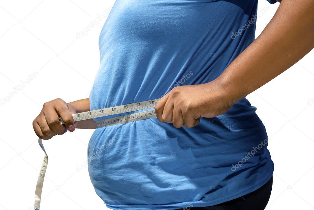 Fat man in blue clothes measuring his body with measuring tape isolated over white background. Fat man diet