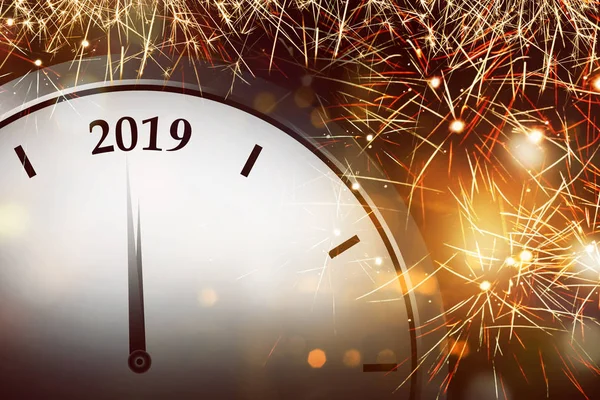 Clock counting down towards 2019 with sparkle background. Happy New Year 2019
