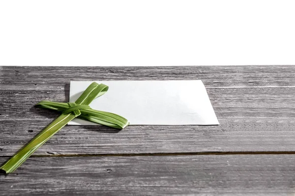 Cross Shape Palm Leaf Wooden Table Blank White Paper White — Stock Photo, Image