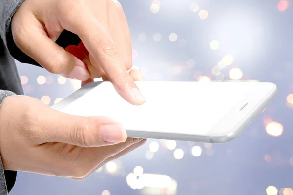 Business woman touching the empty white screen of mobile phone f — Stock Photo, Image