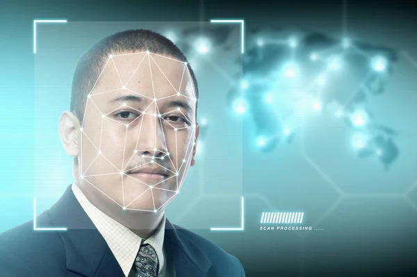 Handsome asian businessman using face recognition — Stock Photo, Image