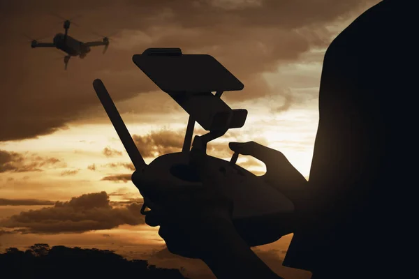 Silhouette Rear View Man Controlling Drone Which Flying Air Sunset — Stock Photo, Image