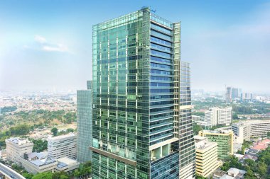 Öğleden sonra kentsel gökdelenler ile Jakarta şehir silueti