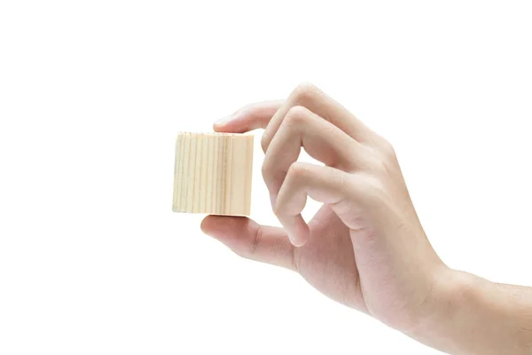 Hand holding wooden block toy — Stock Photo, Image