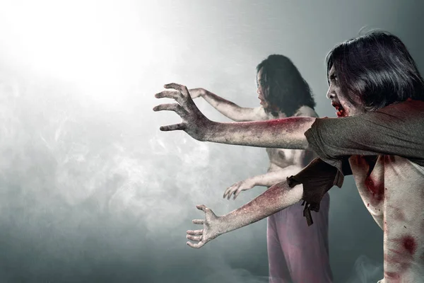 Two scary zombies with blood and wound on his body — Stock Photo, Image