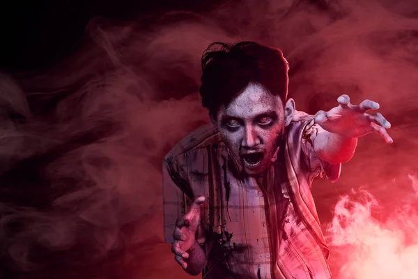 Scary zombies with blood and wound on his body walking amid the — Stock Photo, Image