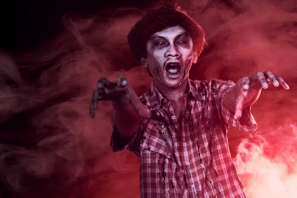 Scary zombies with blood and wound on his body walking amid the — Stock Photo, Image