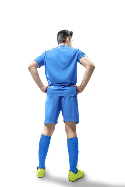 立っているサッカー選手の男の背面図 — ストック写真