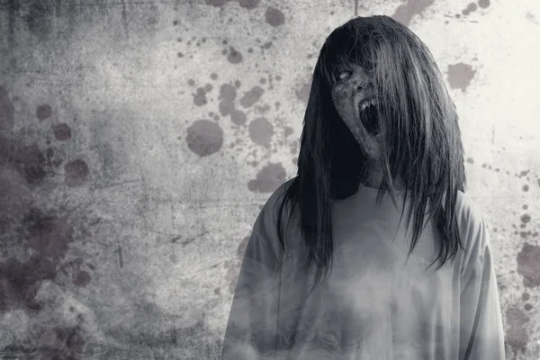 Scary ghost woman with blood and angry face standing over a dirt — Stock Photo, Image