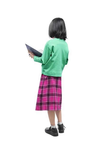 Rear view of Asian cute girl standing while reading the book — Stock Photo, Image