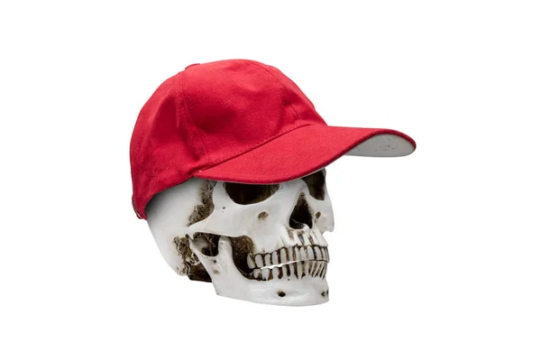Crânio humano usando um chapéu vermelho — Fotografia de Stock