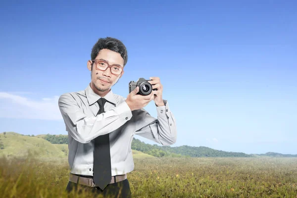 Asian Businessman Holding Camera Meadow Field World Photography Day — Stock Photo, Image