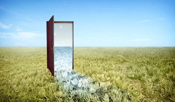 The opened door from summer to winter climate on the meadow field. Concept of changing the environment