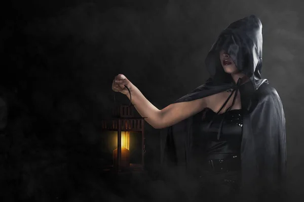Asian Witch Woman Black Cloak Holding Lantern Standing Dark Background — Stock Photo, Image