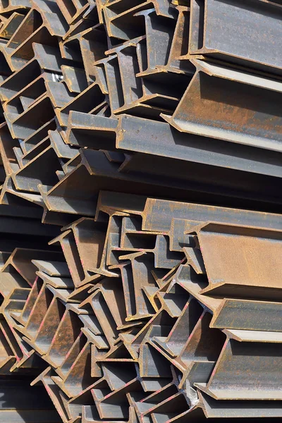 Metal profile beam in packs at the warehouse of metal products — Stock Photo, Image