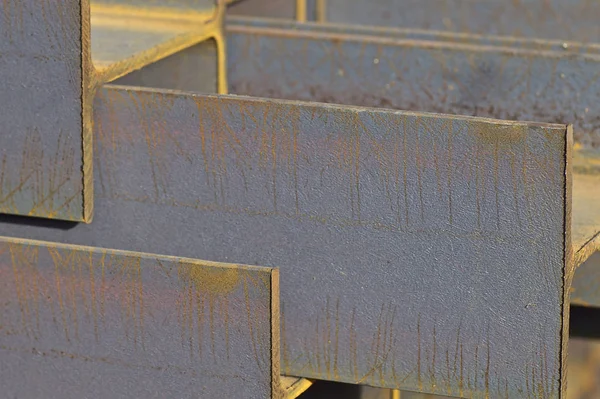 Metal profile beam in packs at the warehouse of metal products — Stock Photo, Image