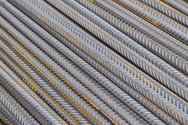 Reinforcing bars with a periodic profile in the packs are stored in the metal products warehouse — Stock Photo, Image