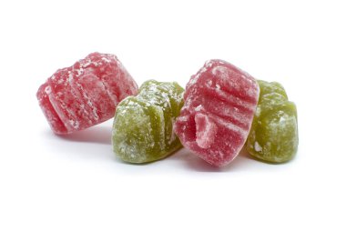 Jelly Baby Sweets two red and two green on a white background with a sweet candy sugary coating. An image that would be good for confectioner or similar.