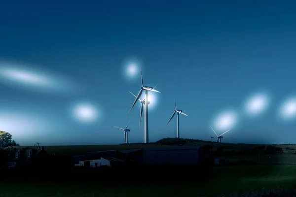Wind Turbines in Scotland Near Ardrossan with etherial Star strobes