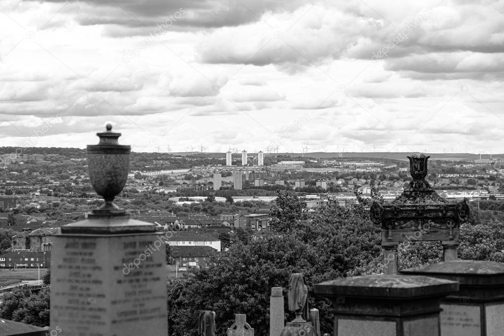 Looking out Between two Monuments from the Necropolis over the c