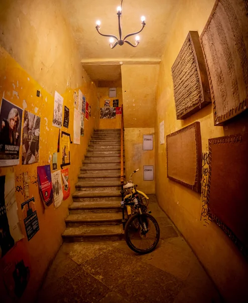 Old apartment hallway stairs going up