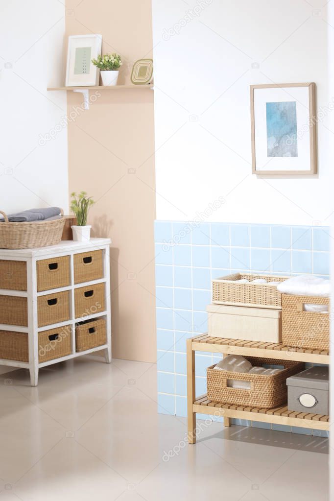 a shelf and drawer cabinet in home used store the bathroom towels