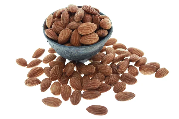 Almonds in small crockery bowl top view — Stock Photo, Image