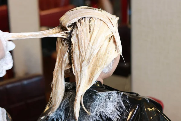 hair bleaching in side view horizontal