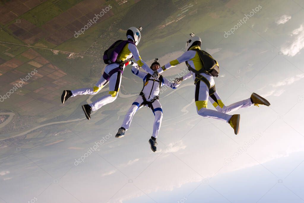 Group of skydivers in freefall.
