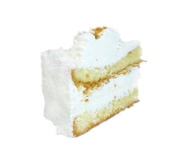 Lezzetli iştah açıcı tatlı üçgen kremalı pasta beyaz arka planda izole edilmiş beyaz hindistan cevizi taneleriyle kaplı.