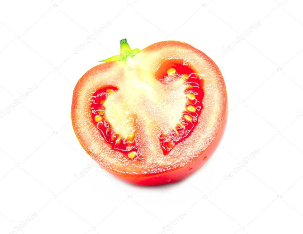 One ripe bright red half of tomato with green tail isolated on white background