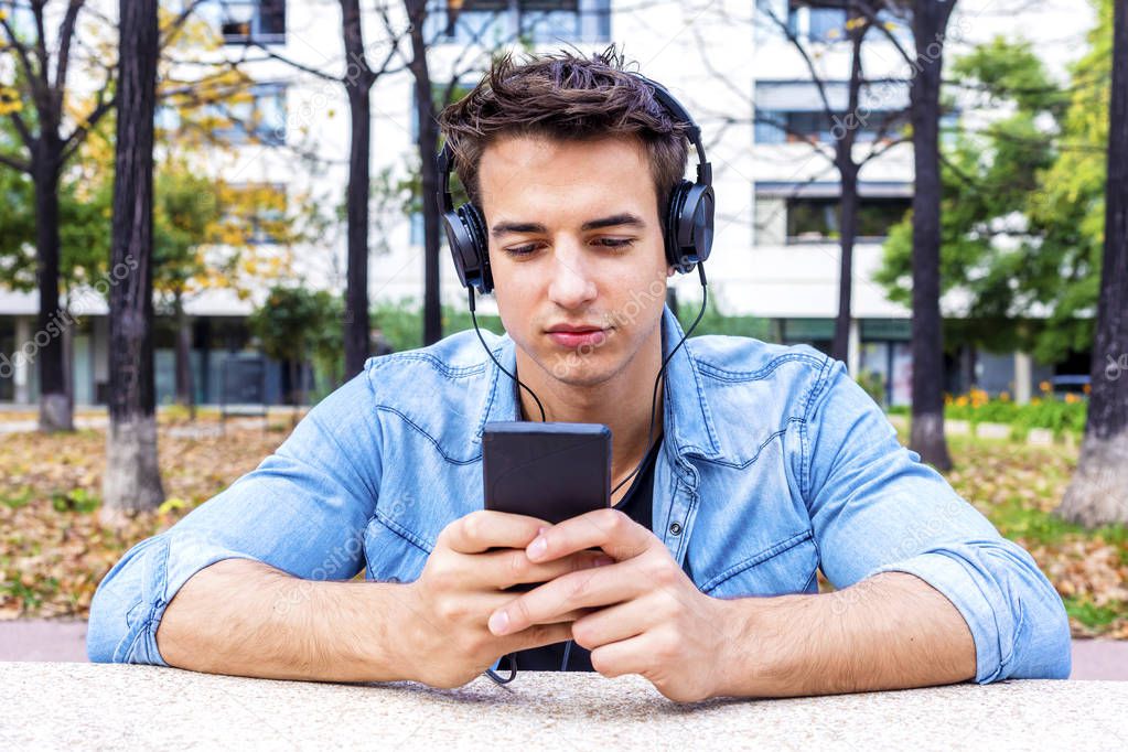 Man sitting listening music Headphones concept