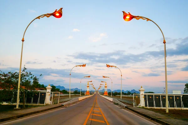 The sunset time of Third ThaiLao Friendship Bridge, over the Mekong is a bridge in Nakhon Phanom Province, Thailand — Stock Photo, Image