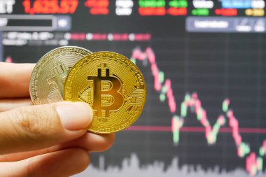 Hisse senedi ekranında Altın Bitcoin eli