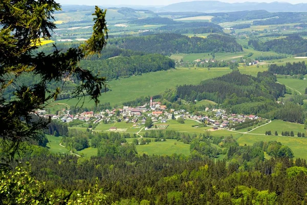 Small town in the mountains, green country landscape